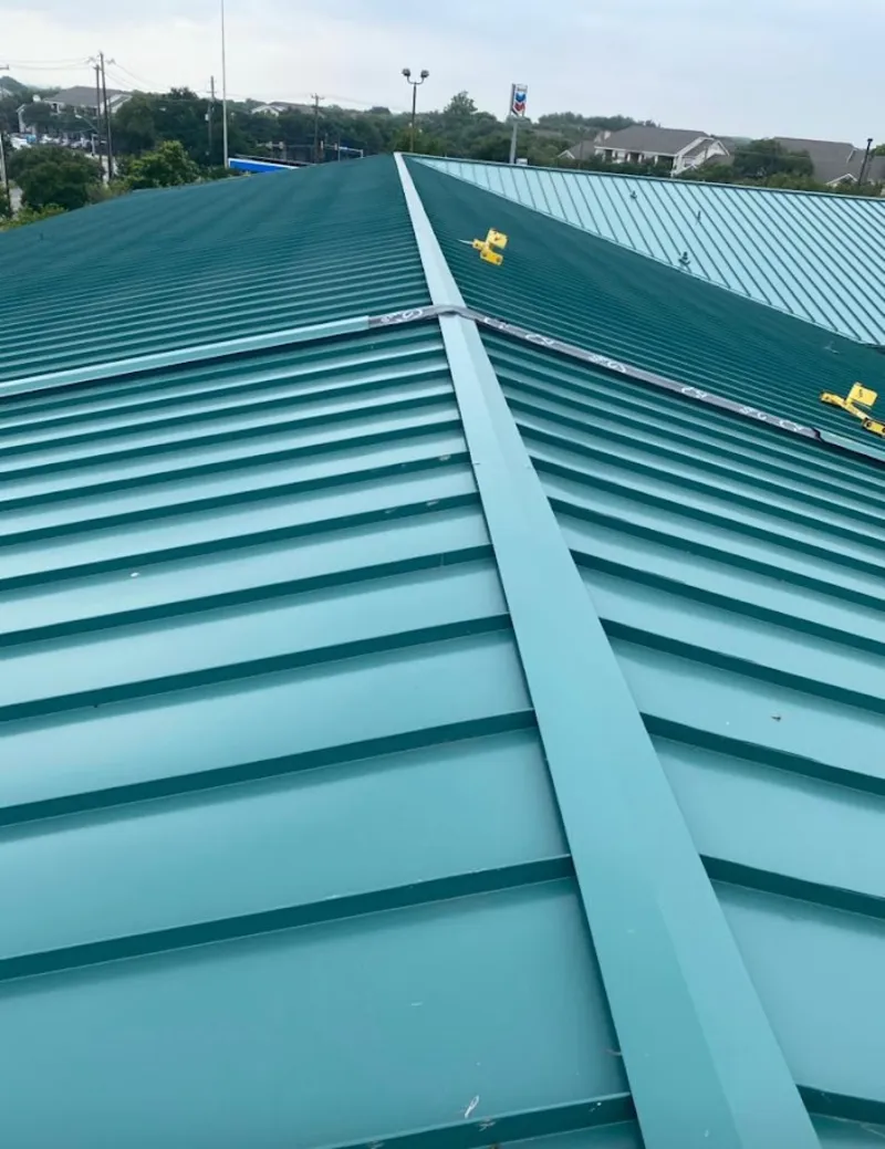 Green commercial metal roof ridge and valley for Metal Roof Repair in Battlement Mesa